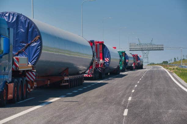 transport of steel wind turbine mast components by trucks